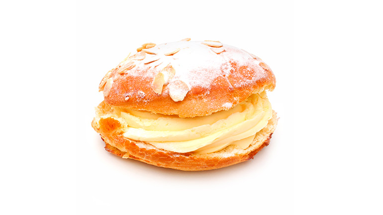 Tropézienne, french pastry isolated on white background